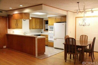 Open kitchen area with convenient dining room area