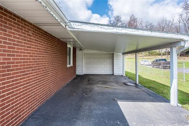 There is plenty of parking with a one car garage a