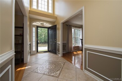 Welcome guests in a custom tiled entryway!