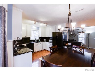 Another view of the eat-in kitchen.