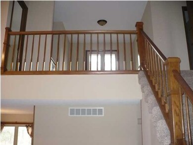 STAIRWAY GOING UPSTAIRS INTO LOFT AND BEDROOMS