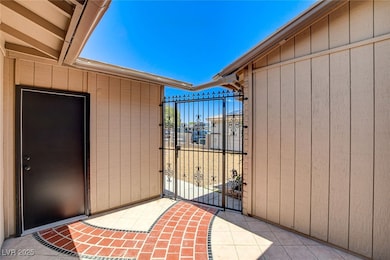 View of exterior entry featuring a gate