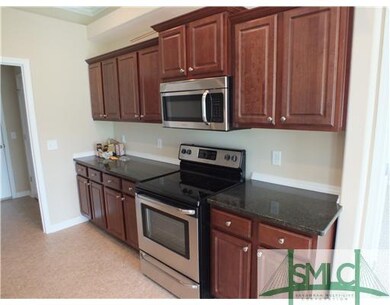 Kitchen. double door pantry at garage entry to the