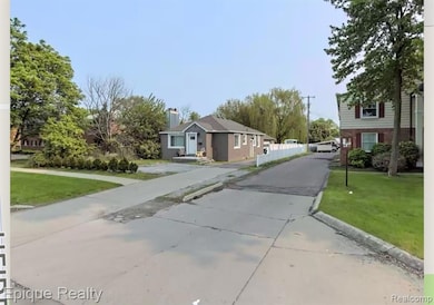 View of concrete road with a residential view