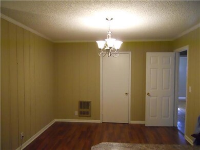 Dining Room With Hardwood Flooring