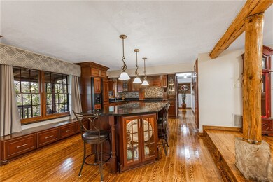 Cherry wood cabinets with built-in appliances and