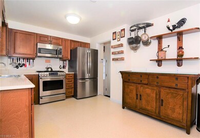 Kitchen updated in 2005 with cherry cabinets and q