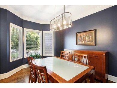 Formal dining room with bay window