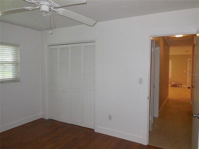 Bedroom 3 looking down hall to living area