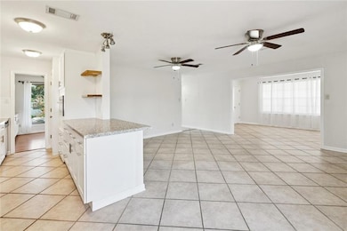 Large living space.  The large entry leads to what could be a great 4th bedroom, office or playroom.  Perfect flex space for what you need!