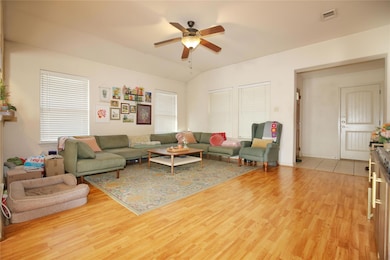 Living area featuring light wood finished floors,