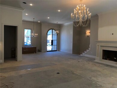 Dining and foyer open to living area