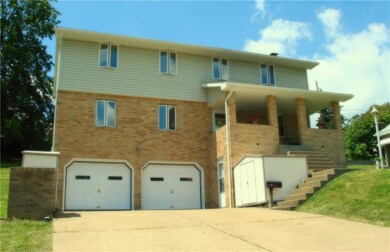 Two-car garage and sheds included for your storage