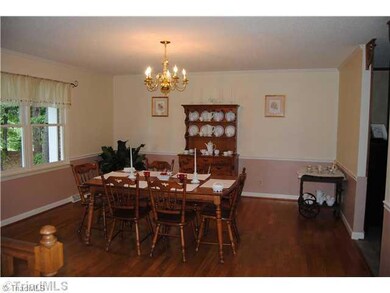Dining Room. Split foyer offers formal dining areas for those large family gatherings. hardwood floors thru out the upstairs makes this home very family friendly