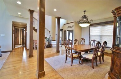Beautiful open foyer, dining room and opens to gre