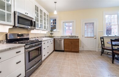 Spacious kitchen, including lots of counter space and eating nook.