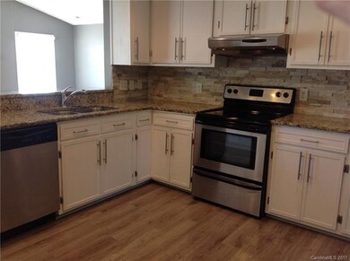 kitchen opens into great room ---Note granite coun