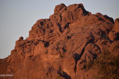 Praying Monk at Sunset