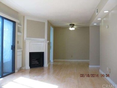 LIVING ROOM WITH FIREPLACE, RECESSED LIGHTS & LAMI