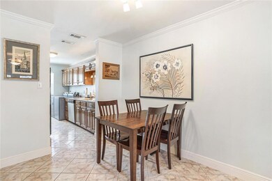 Dining area leading to kitchen