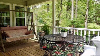 Awesome back porch, listen to babbling brook