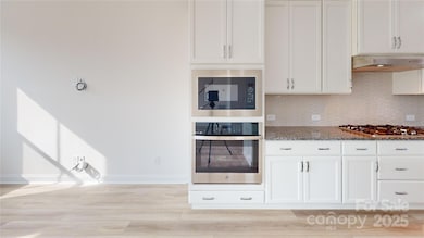 2143 Barrowcliffe Dr NW, Concord, NC 28027 - photo 6