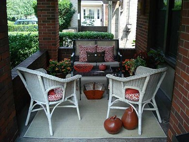 Facade/Exterior Front. Charming porch...
