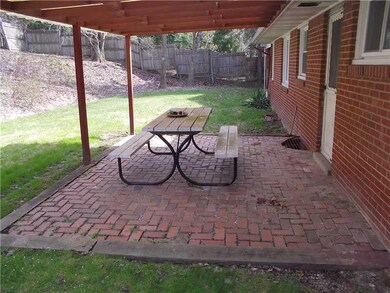Exterior Back. This picture highlights the brick p