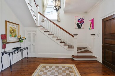 Elegant entrance foyer with beautiful staircase