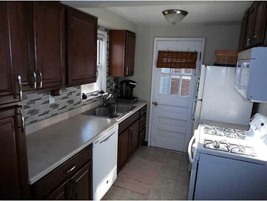 Kitchen. Newer kitchen with cherry cabinets and po