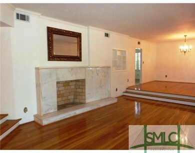 Living Room. Oversized genuine marble faux firepla