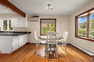 Dining area w/ brand new AC wall-unit