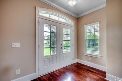 Entryway featuring ornamental molding, a healthy a