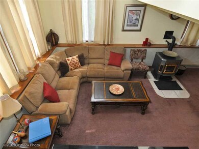 Living Room. Beautiful Marble Tile Under Custom Ar