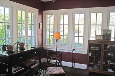 Sunroom with Wood Floor off the Living Room