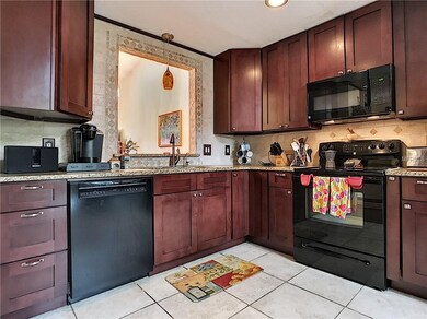 Pass through trimmed in custom tile to dining room