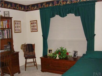 Front bedroom...currently used as an office and has a nice view of the front yard and cul-de-sac