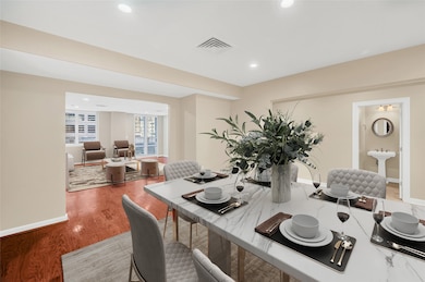 The interior offers an open Living/Dining/Entry fl