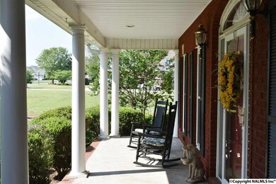 Covered Front Porch spans the Width of The Front Of the Home