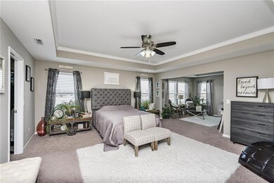 Relax in this oversized master suite w/tray ceiling and large sitting room.  This will surely become your favorite oasis.