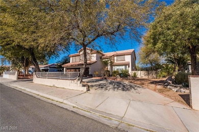 Mediterranean / spanish house with stucco siding and a tiled roof