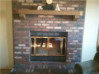 Wood Burning Fireplace in Living Room. .