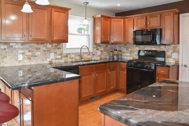 The kitchen comes applianced with a dishwasher, ov
