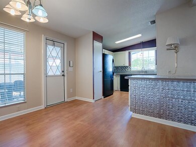 VIEW OF DINING AREA AND KITCHEN