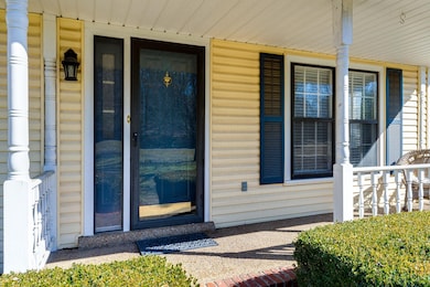 Front door entry with sweet covered porch!