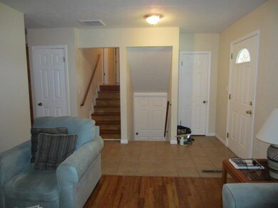 Living room facing stairs