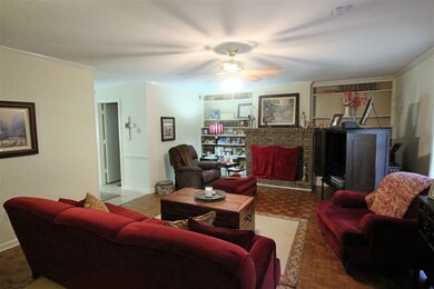Spacious Living Room with a Wood Burning Fireplace