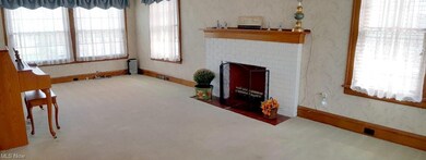 Family roomWooden blinds stay with the home.