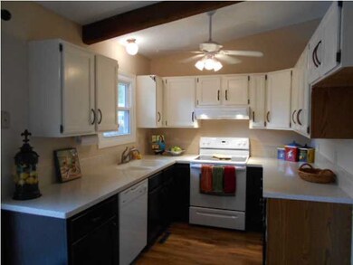 Kitchen has been updated with new appliances, cori