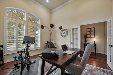 With tons of natural light, plantation shutters, and French Doors that close for privacy; this is the ultimate work space.
